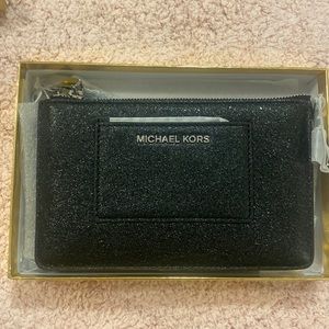 Black Michael Kors never used wristlet